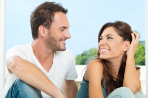 Loving Couple Having Conversation And Looking At Each Other